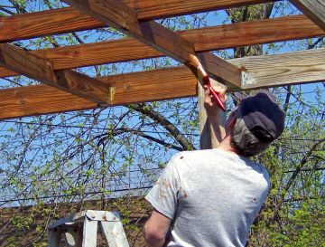Parks Roofing And Painting stains decks in Newport Beach and fences